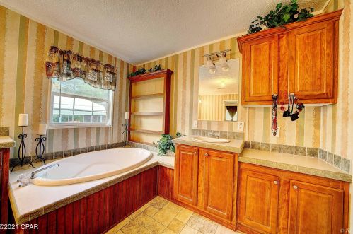 3140 Shadow Trl, Sunny Hills FL  32428-8414 exterior