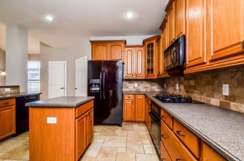 1414 Nighthawk Dr, Oak Point TX  75068-8476 exterior