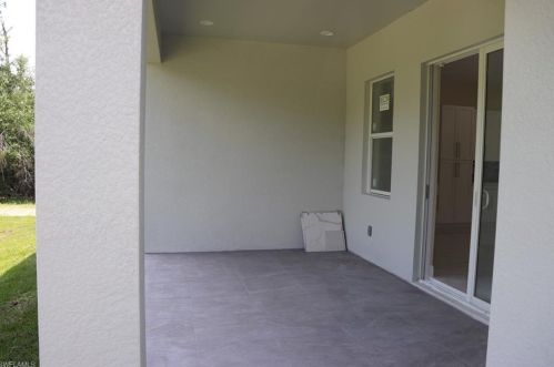 827 Sunrise Blvd, Lehigh Acres FL 33974-9795 exterior