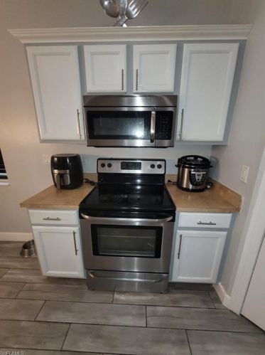 395 Shadow Lakes Dr, Lehigh Acres FL  33974-0808 exterior