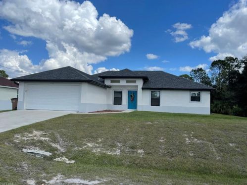 718 Plumosa Ave, Lehigh Acres, FL 33972-7911