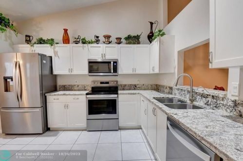6053 Heliconia Rd, Delray Beach, FL 33484-4671