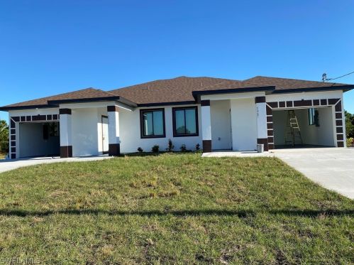 719 Harry Ave, Lehigh Acres FL  33973-1115 exterior