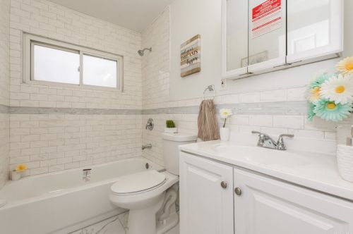 8 Prince Ln, Westbury NY  11590-6229 exterior