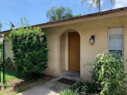 9289 Sunrise Dr, West Palm Beach, FL 33403-1077