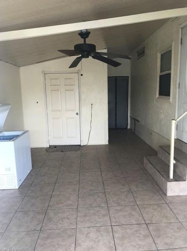910 Plymouth Rock Dr, Naples FL  34110-8809 exterior