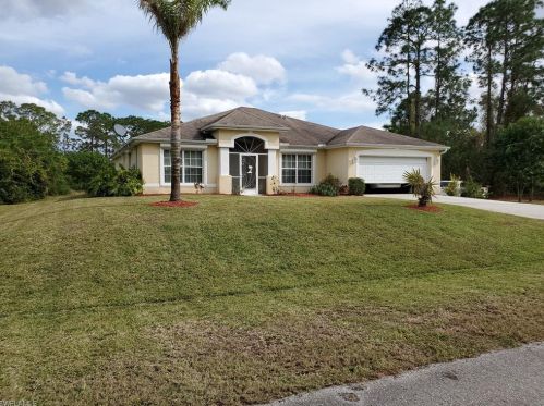 507 Aspen Ave, Lehigh Acres, FL 33974-9648