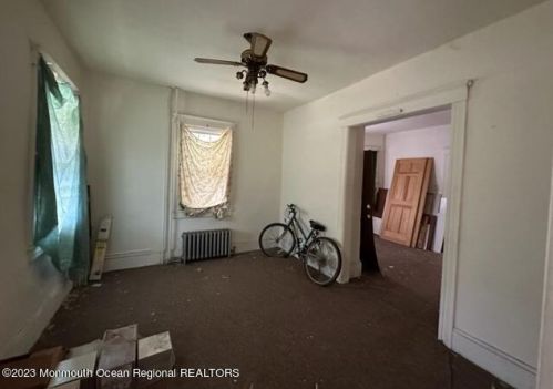 57 Jackson St, East Freehold, NJ 07728-2443