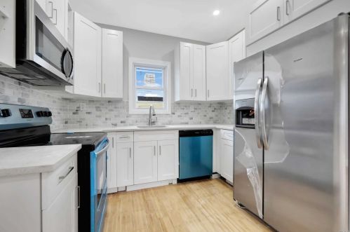 127-18 89th Ave, Jamaica, NY 11418-2411