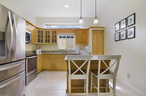 8599 Ibis Cove Cir, Naples FL  34119-7746 exterior