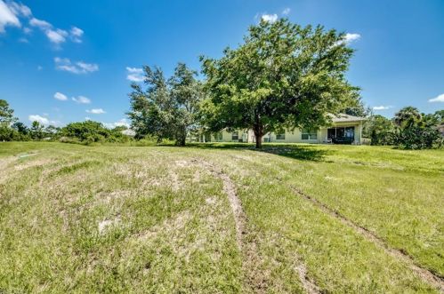 217 Ivan Ave, Lehigh Acres FL 33973-2011 exterior