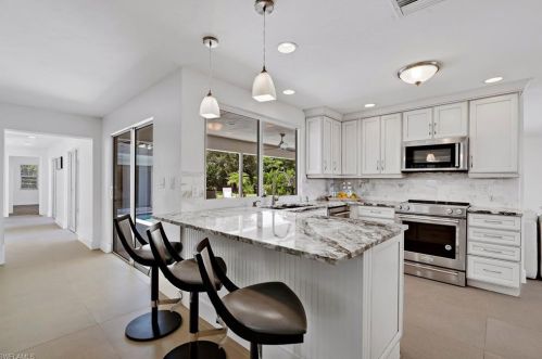 740 Orchid Dr, Naples FL  34102-5015 exterior