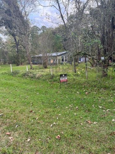 7750 Weeping Willow Ln, Plantersville, TX 77363-1176