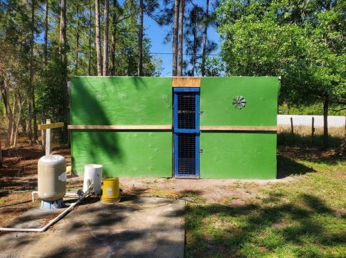 921 Wellington Ave, Lehigh Acres FL 33972-1318 exterior