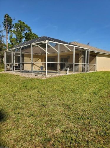 518 Aspen Ave, Lehigh Acres FL 33974-9613 exterior