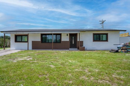 15 Leeland Hts Blvd, Lehigh Acres FL 33936-6431 exterior