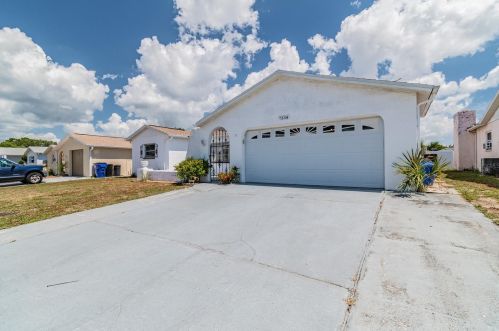 7334 Cay Dr, Port Richey, FL 34668-5713