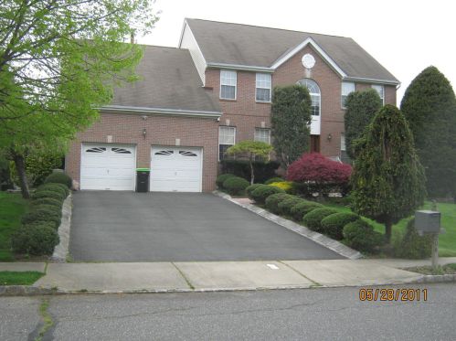 206 Hickory Ln, Morganville, NJ 07751-2044