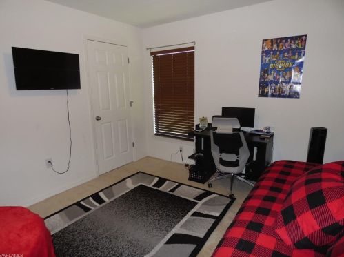 213 Shadow Lakes Dr, Lehigh Acres FL  33974-0806 exterior