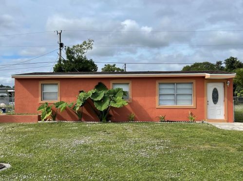 107 Alabama Rd, Lehigh Acres, FL 33936-7104