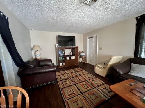 18 Pinewood Blvd, Lehigh Acres FL  33936-7304 exterior