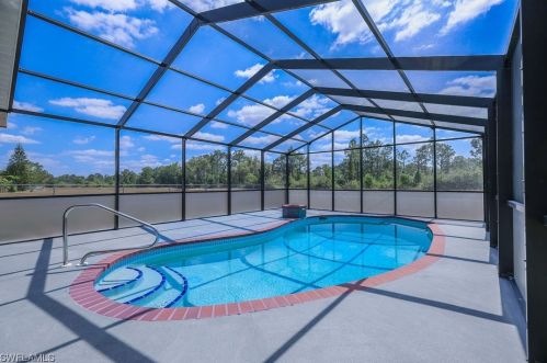 415 Candlewick Cir, Lehigh Acres, FL 33936-7743