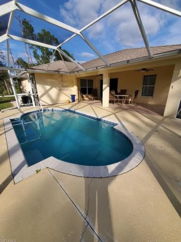 518 Aspen Ave, Lehigh Acres FL 33974-9613 exterior