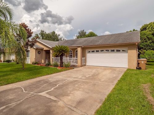 242 Cedarwood Cir, Kissimmee, FL 34743-9064