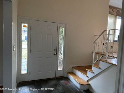 6 Fletcher Dr, Morganville, NJ 07751-1405