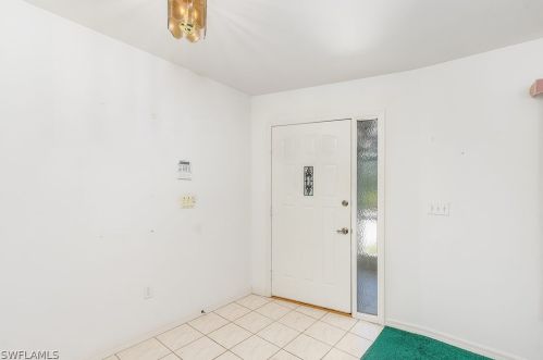 1216 Robert Ave, Lehigh Acres FL 33972-1712 exterior