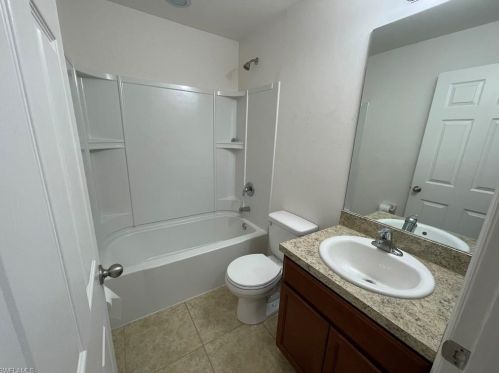 128 Shadow Lakes Dr, Lehigh Acres FL  33974-0803 exterior