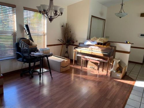 414 Palmetto Ave, Lehigh Acres FL 33972-7859 exterior