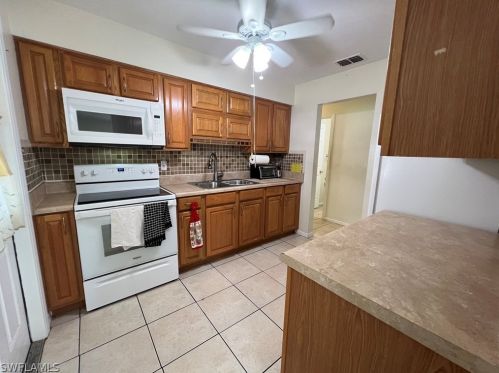 14 Desert Candle Cir, Lehigh Acres FL 33936-7360 exterior