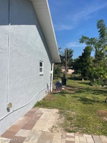 206 Floyd Ave, Lehigh Acres FL 33971-1716 exterior