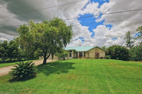 732 Chavers St, Lehigh Acres, FL 33974-9691