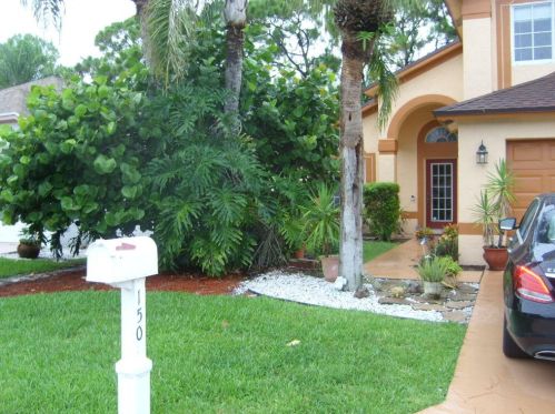 150 Paddock Ln, West Palm Beach, FL 33413-2138