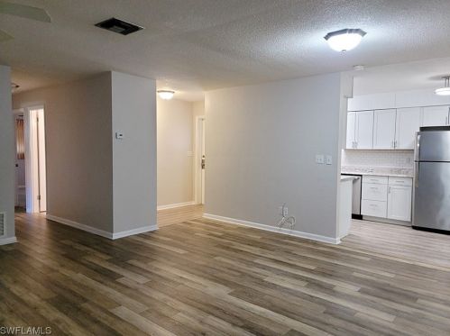 203 Oaklawn Ct, Lehigh Acres, FL 33936-1446