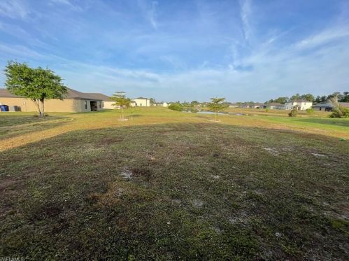 128 Shadow Lakes Dr, Lehigh Acres FL  33974-0803 exterior