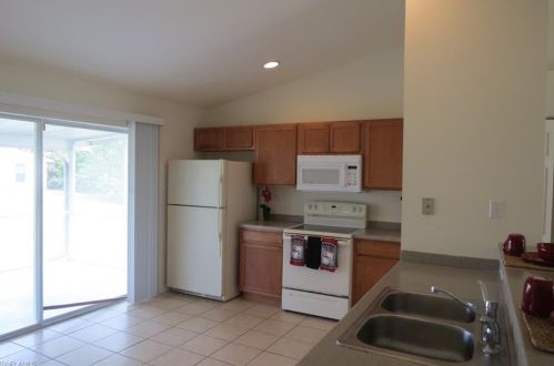 143 Pageant St, Lehigh Acres, FL 33974-9496