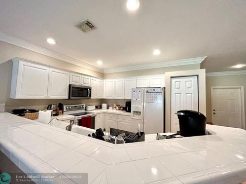 13366 Georgian Ct, West Palm Beach, FL 33414-3952