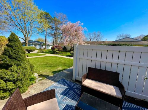 63 Storm Dr, Holtsville NY  11742-1909 exterior