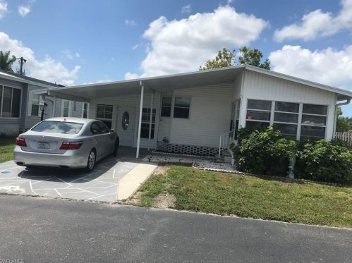 910 Plymouth Rock Dr, Naples FL  34110-8809 exterior
