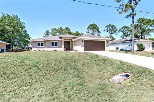 341 Piper Ave, Lehigh Acres, FL 33974-0450
