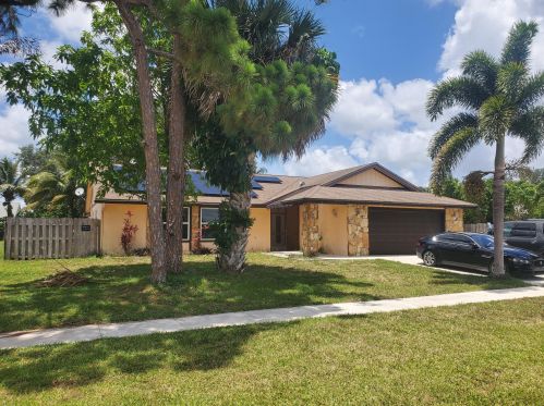 363 La Mancha Ave, West Palm Beach, FL 33411-1033