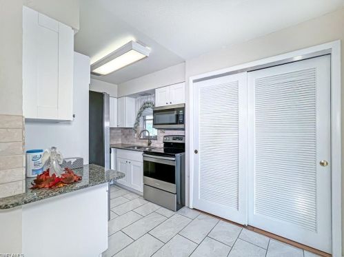 279 Rosewood Ct, Lehigh Acres FL  33936-1448 exterior