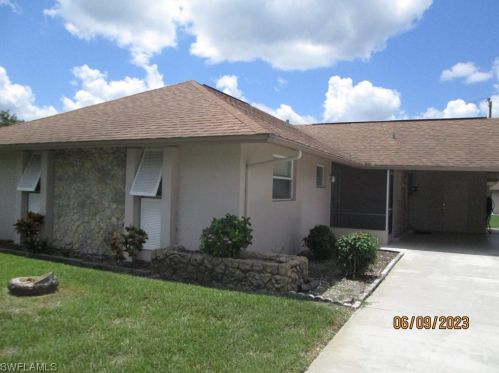 257 Briar Ct, Lehigh Acres, FL 33936-1461