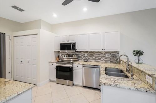 7488 Berkshire Pines Dr, Naples FL  34104-9436 exterior