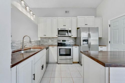 2302 Merrimack Dr, Kissimmee FL 34743-7899 exterior