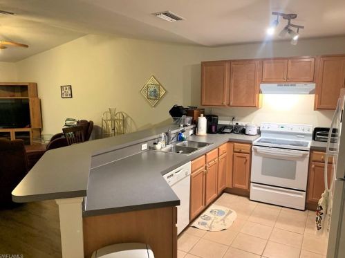 712 Holmes Ave, Lehigh Acres FL 33974-5500 exterior