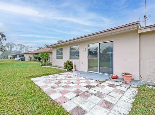 279 Rosewood Ct, Lehigh Acres FL  33936-1448 exterior